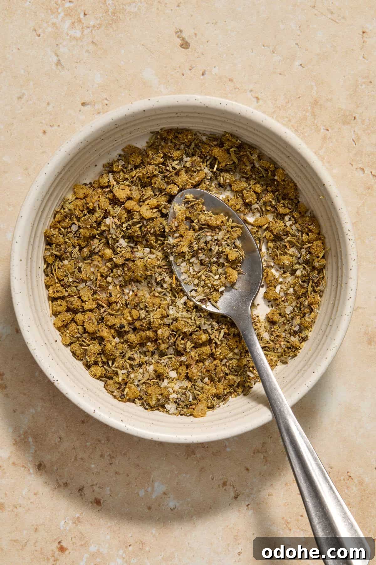 Perfect Instant Pot Pork Tenderloin Recipe for Juicy Results 5 Seasonings mixed together in bowl with spoon.