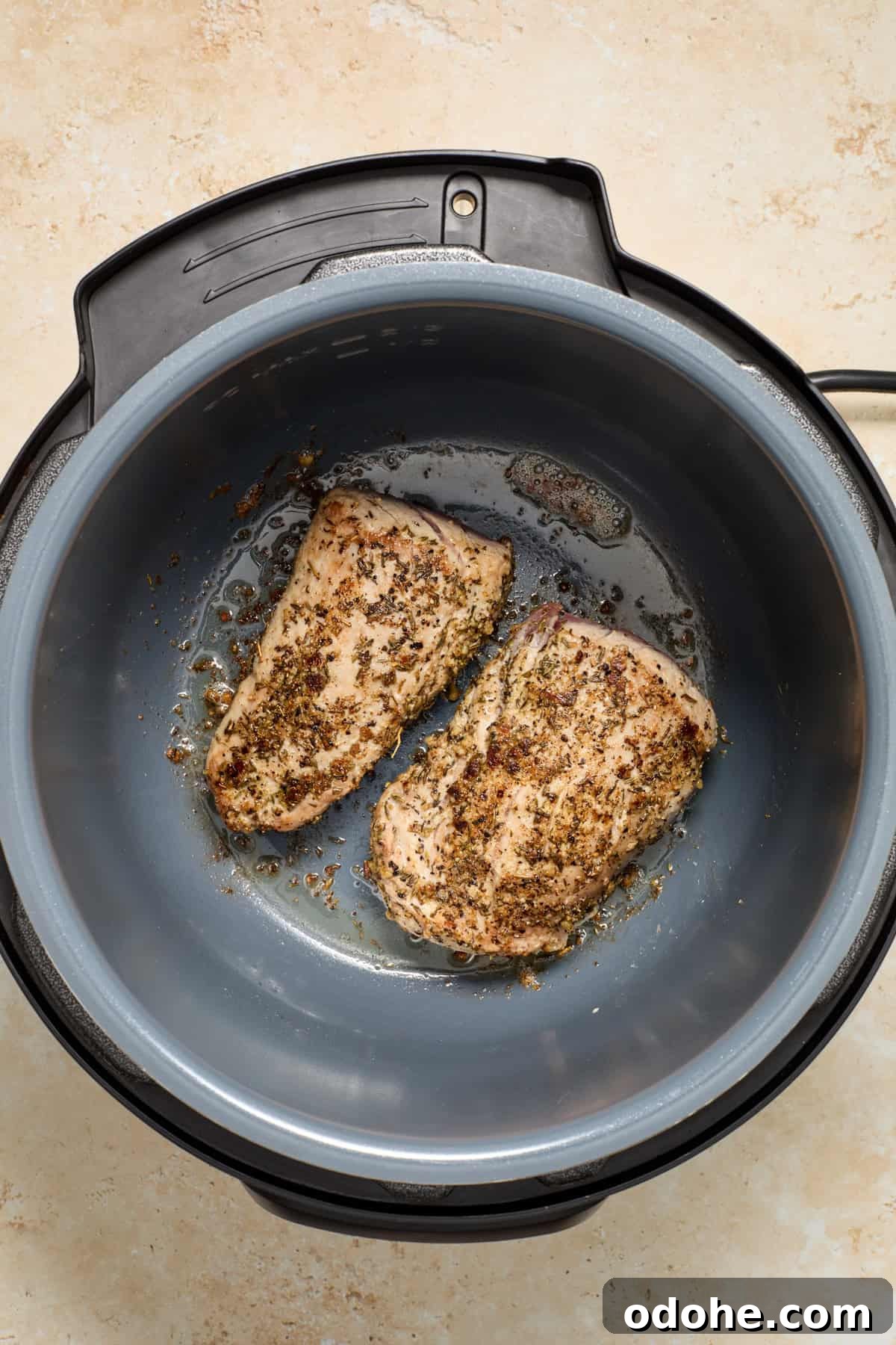 Perfect Instant Pot Pork Tenderloin Recipe for Juicy Results 7 Seared pork tenderloin in Instant pot.