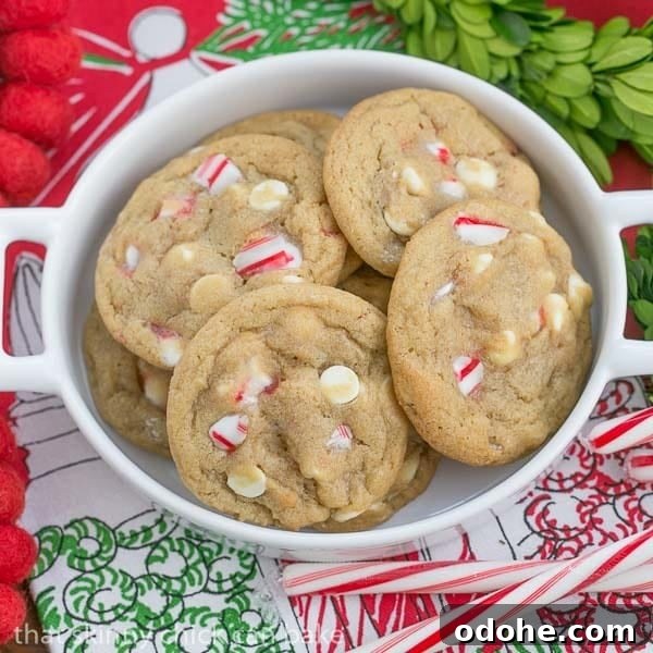 White Chocolate and Candy Cane Cookies 3 White Chocolate Candy Cane Cookies | A chewy, buttery cookie filled with white chocolate chips and crushed candy canes.