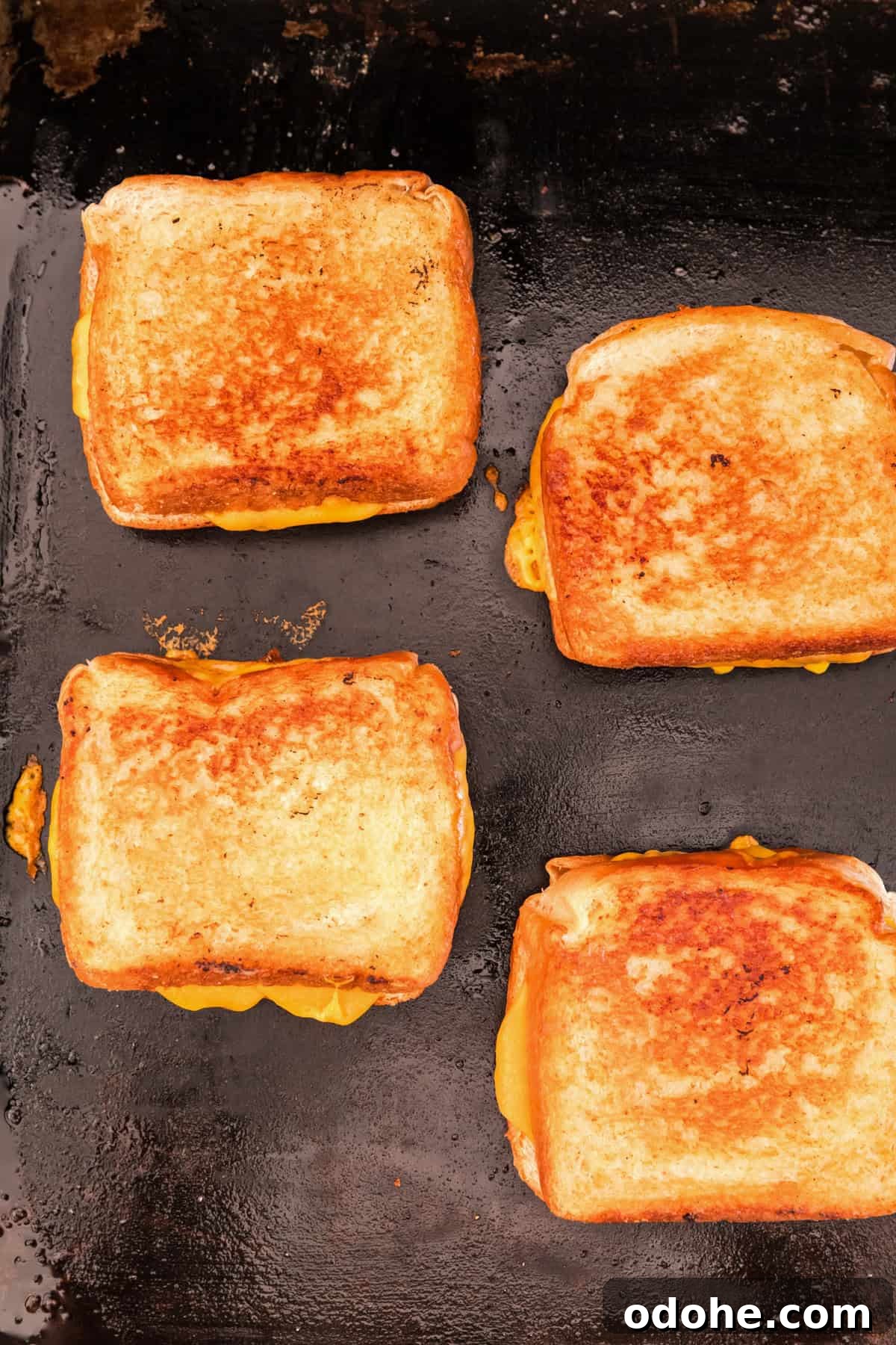 Perfect Grilled Cheese on a Blackstone Griddle: Melted & Crispy 8 Blackstone Grilled Cheese grilled to a perfect golden brown