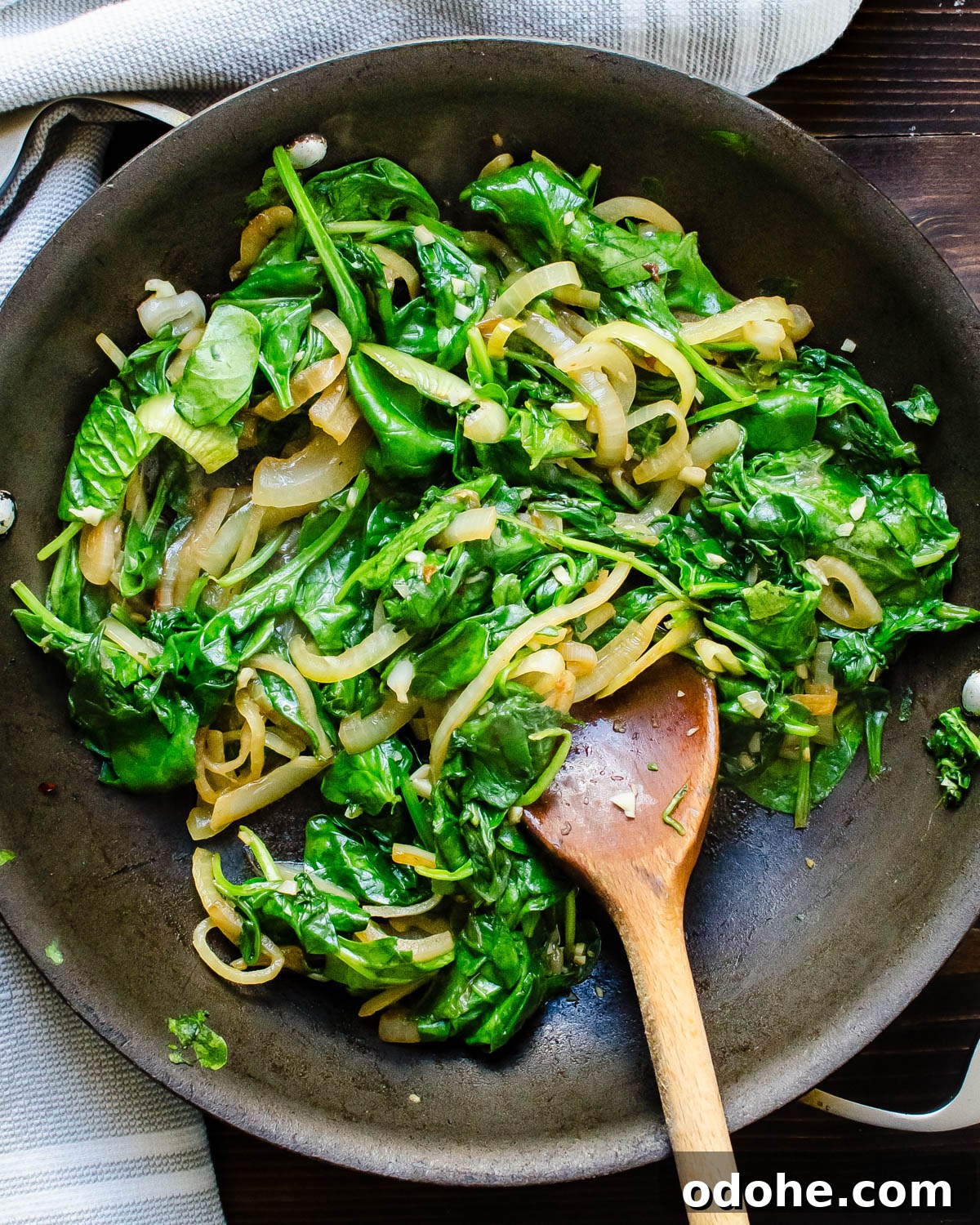 Spinach and Mushroom Mini Frittatas for Quick Breakfasts 3 Sauteing spinach and shallots.