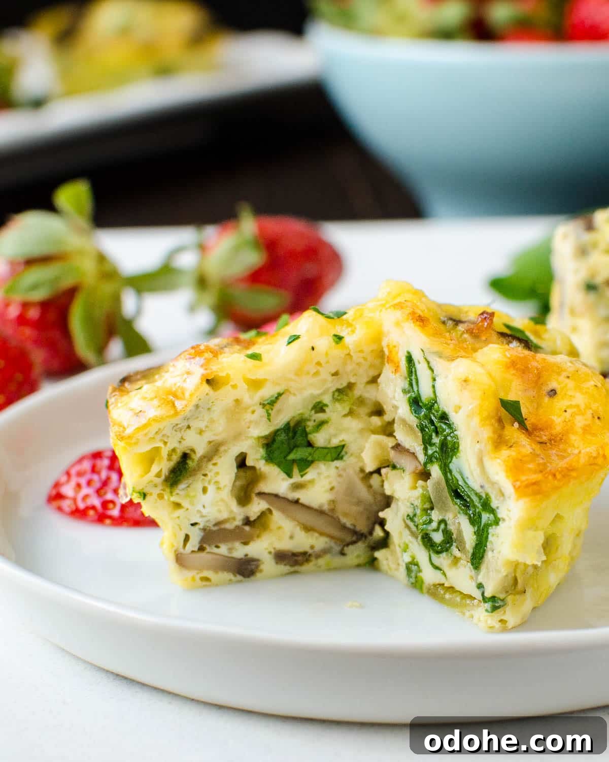 Spinach and Mushroom Mini Frittatas for Quick Breakfasts 9 Cutting into the individual frittatas.
