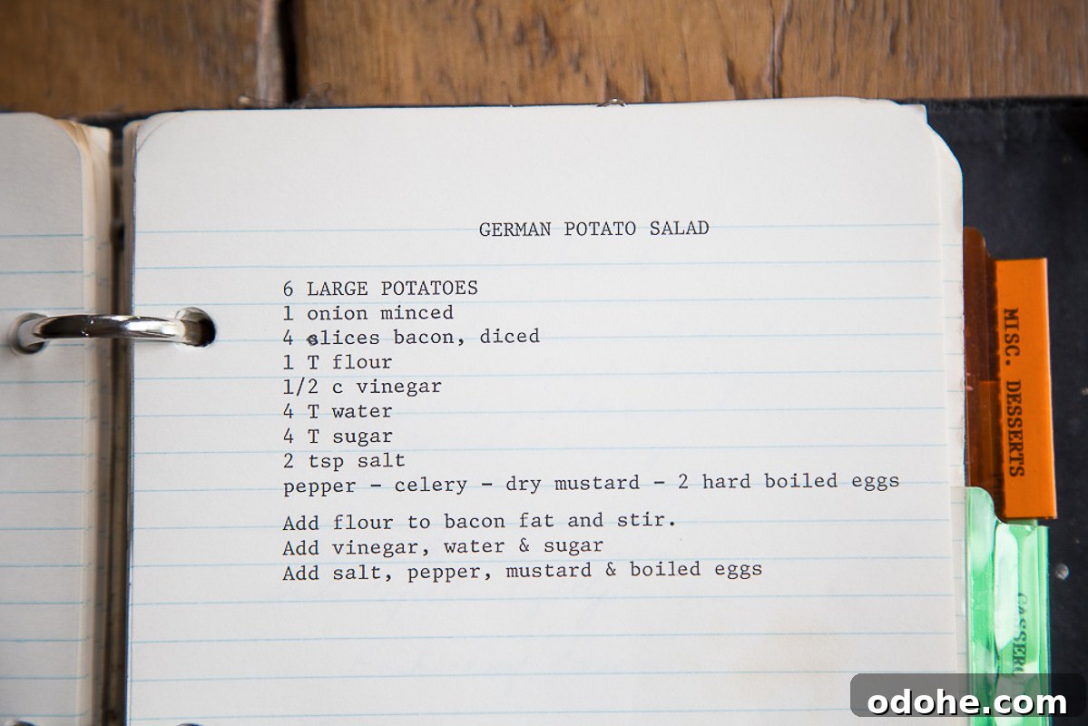 Authentic German Potato Salad with Hard-Boiled Eggs & Bacon 3 lined notebook paper with a recipe for german potato salad printed using a typewriter