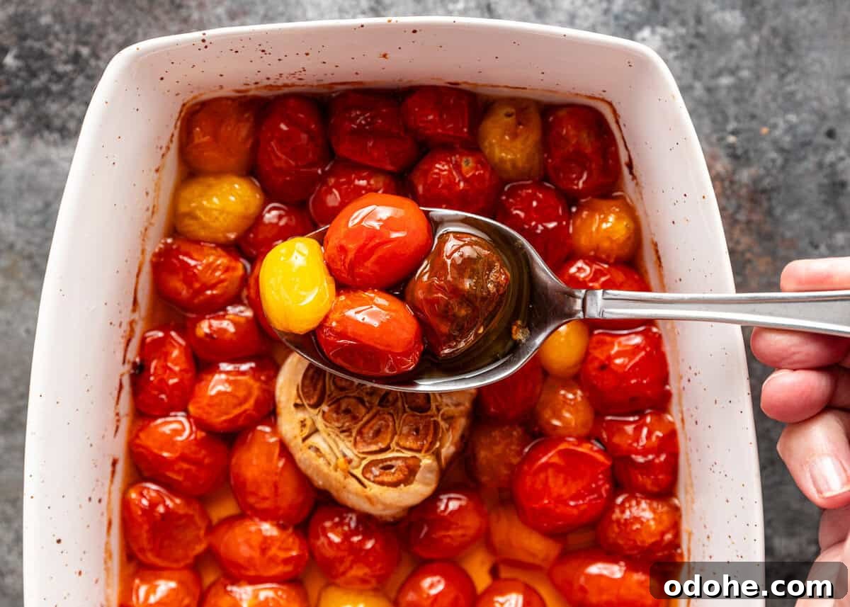 Slow-Roasted Cherry Tomato Confit Recipe for Flavorful Dishes 13 overhead: a spoonful of my tomato confit recipe