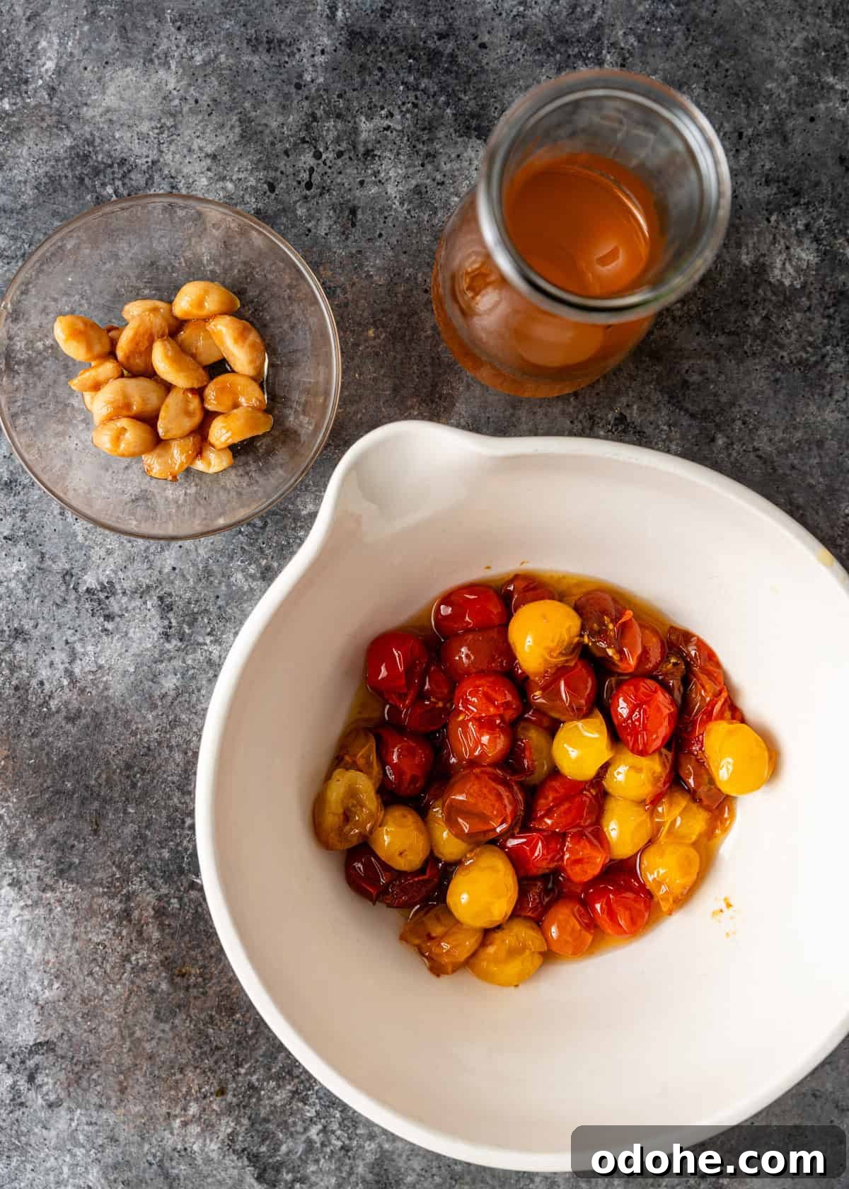 Slow-Roasted Cherry Tomato Confit Recipe for Flavorful Dishes 7 overhead: prepared tomato garlic confit ingredients, separated