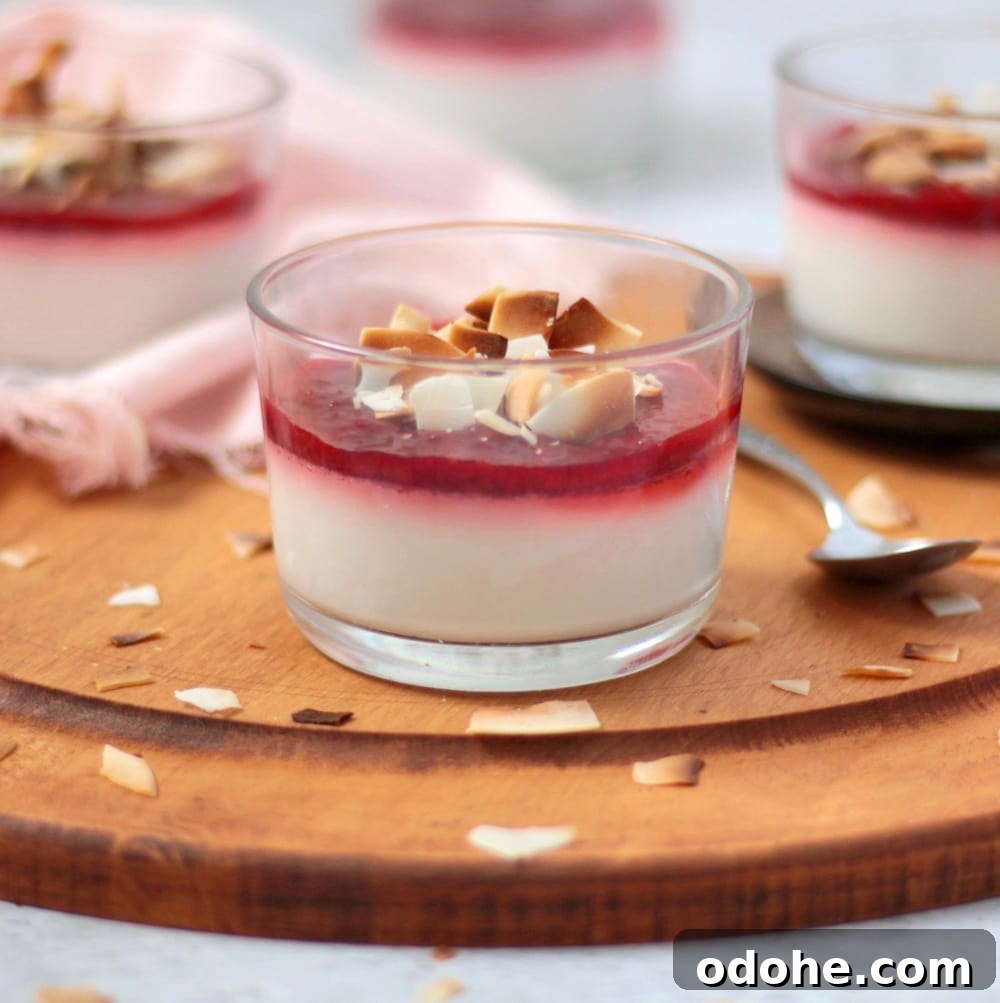 Vegan Coconut Panna Cotta with Fresh Strawberries 2 Close up on the Panna Cotta in a glass cup on a wooden board