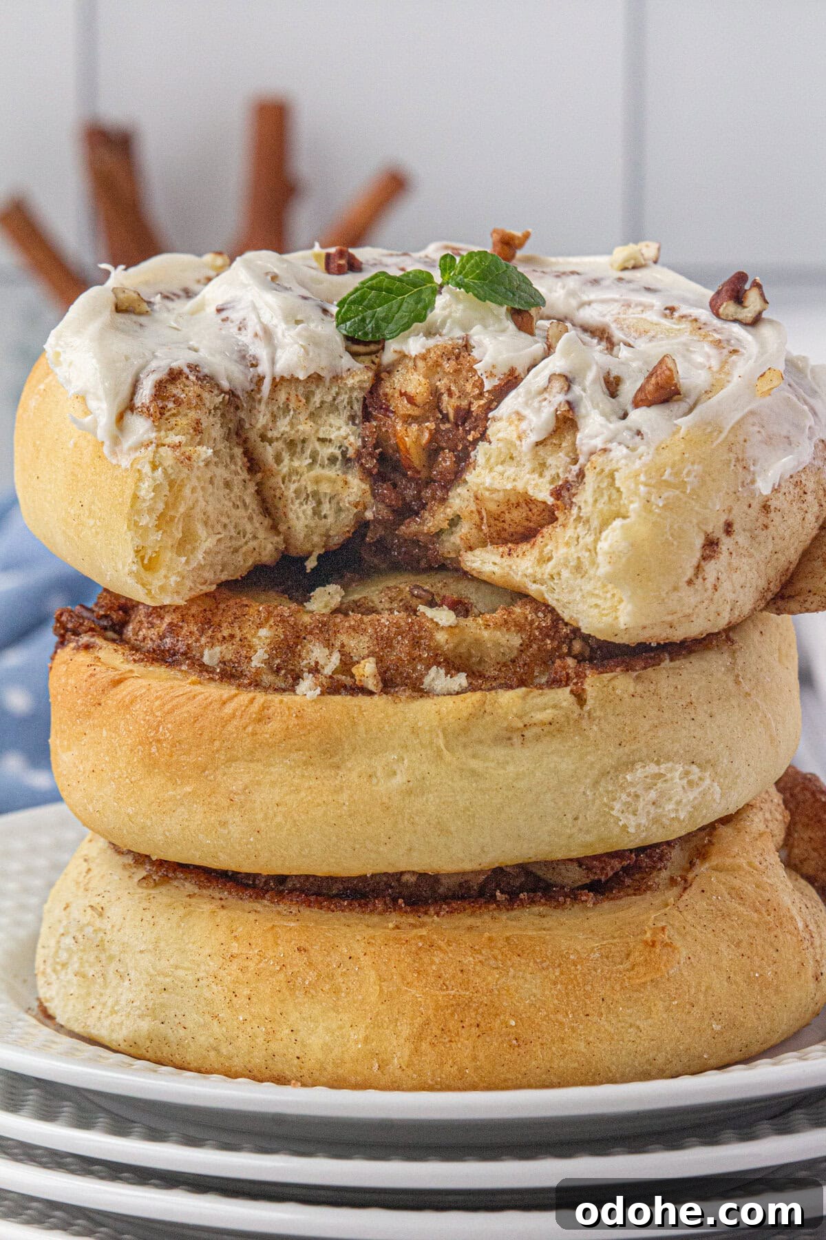 Giant Texas-Style Cinnamon Rolls: Soft, Gooey, Oversized Treat 13 A stack of cinnamon rolls.
