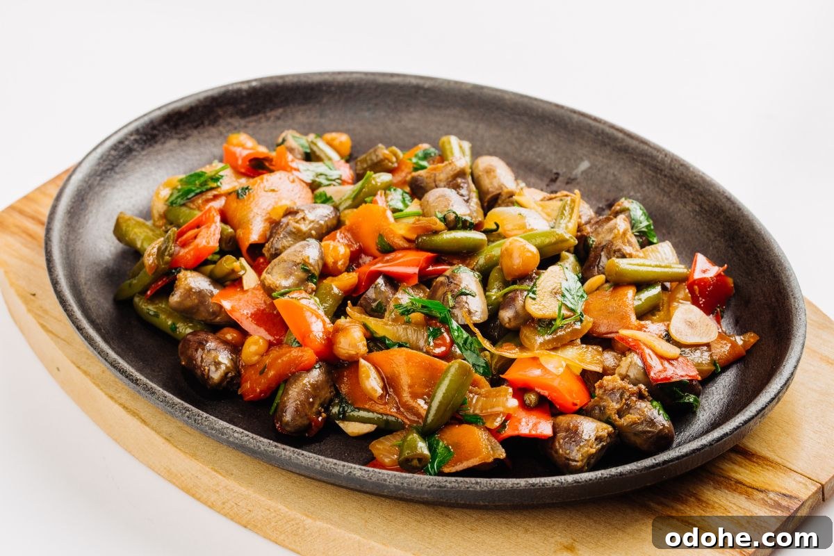 fried chicken hearts with onion and carrot