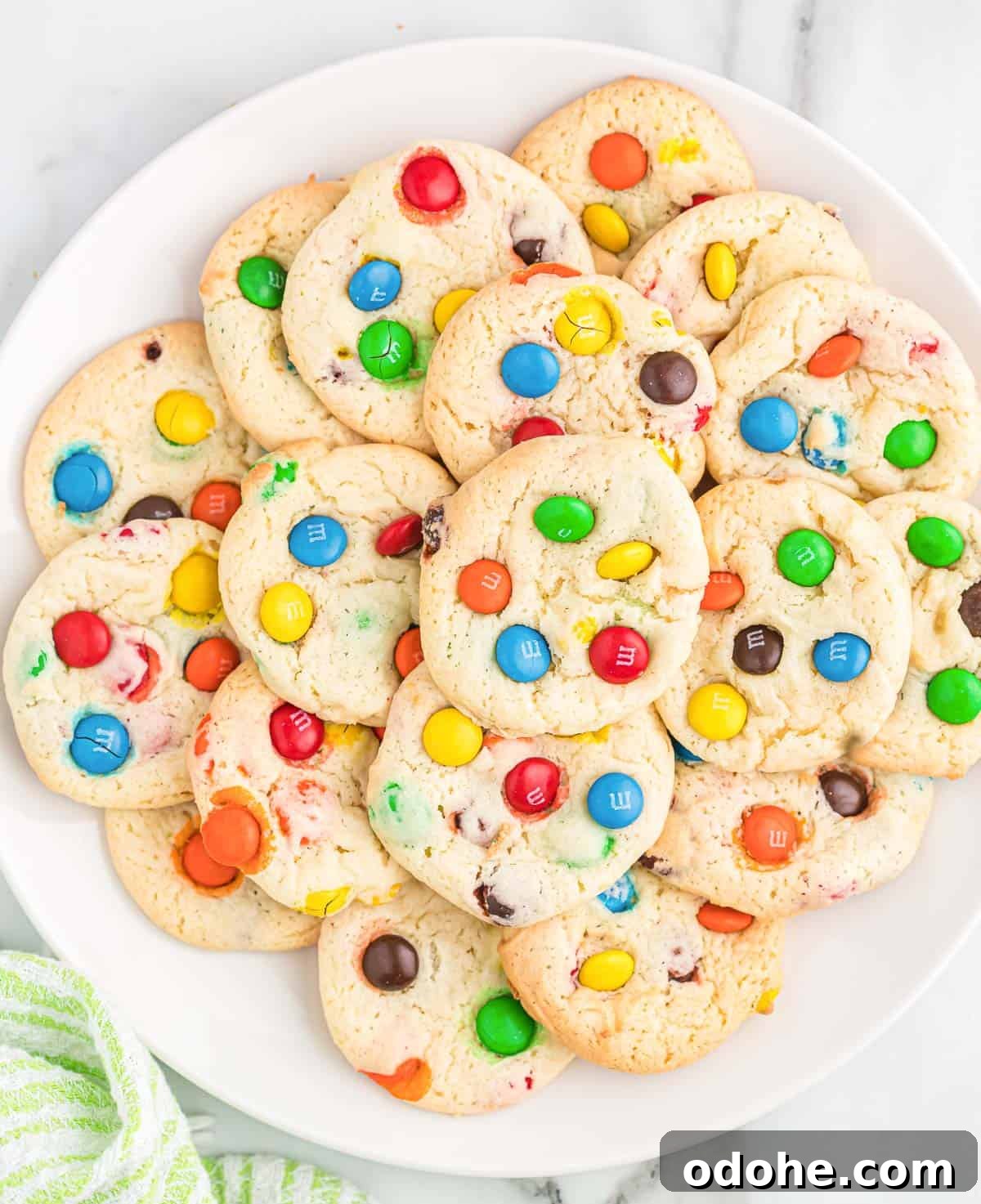 Chewy Cookies Made from White Cake Mix 2 m&m cookies on a white plate
