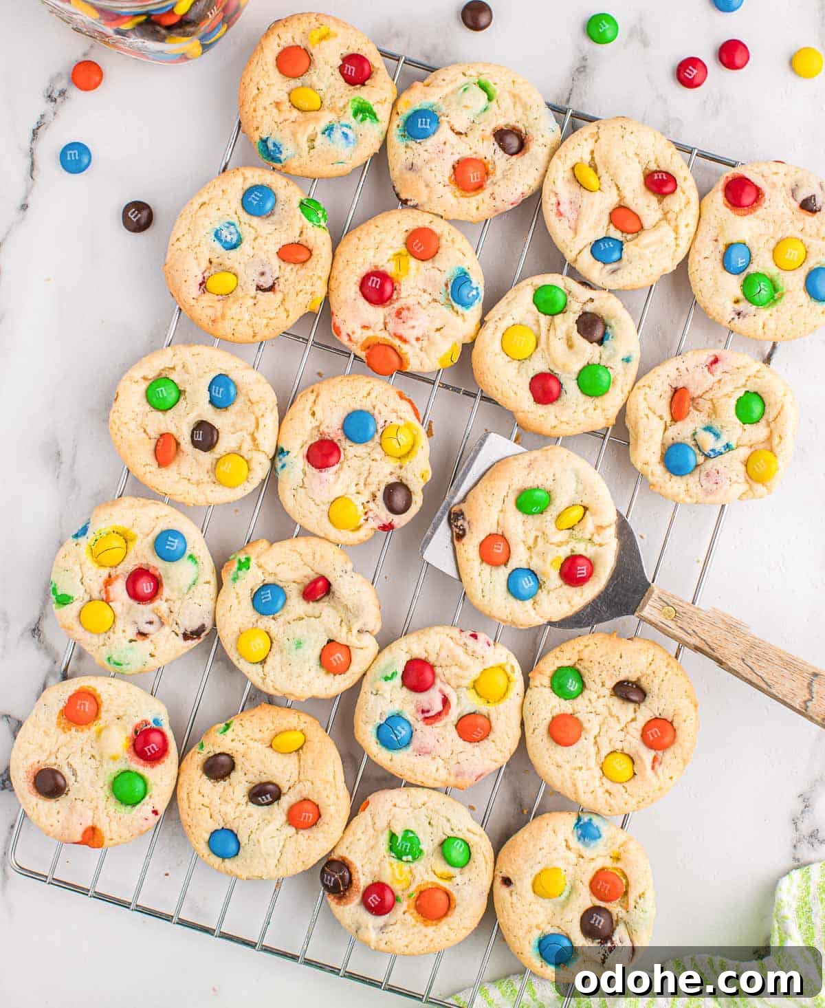 Chewy Cookies Made from White Cake Mix 3 white cake mix cookies on a cooling rack