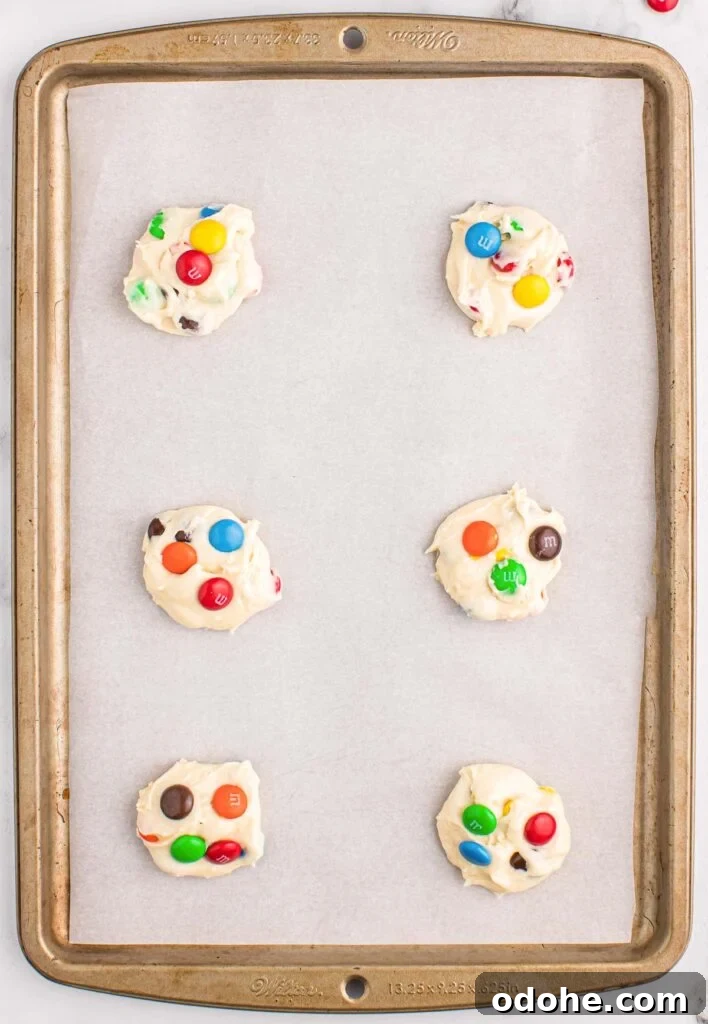Chewy Cookies Made from White Cake Mix 7 cake mix cookie batter on a lined baking sheet