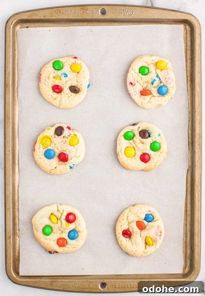 Chewy Cookies Made from White Cake Mix 8 white cake mix cookies on a baking sheet