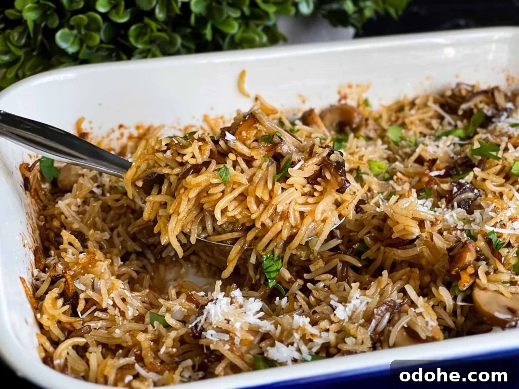 Basmati rice risotto (stick of butter rice) in a casserole dish.