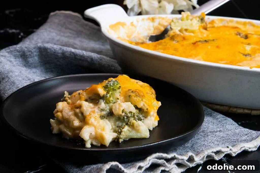 Broccoli rice casserole on black plate.