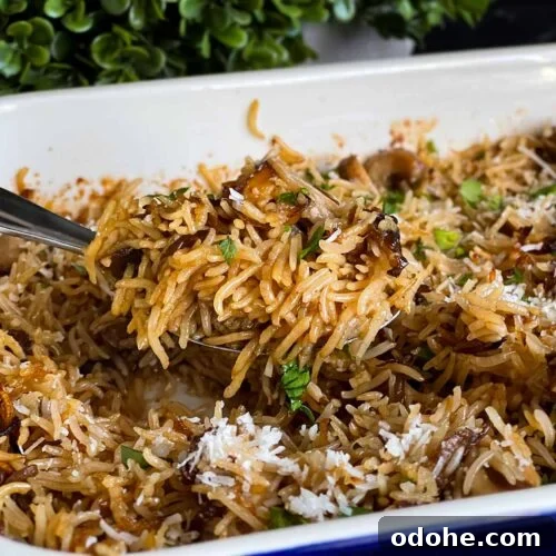 Basmati rice risotto (stick of butter rice) in a casserole dish.