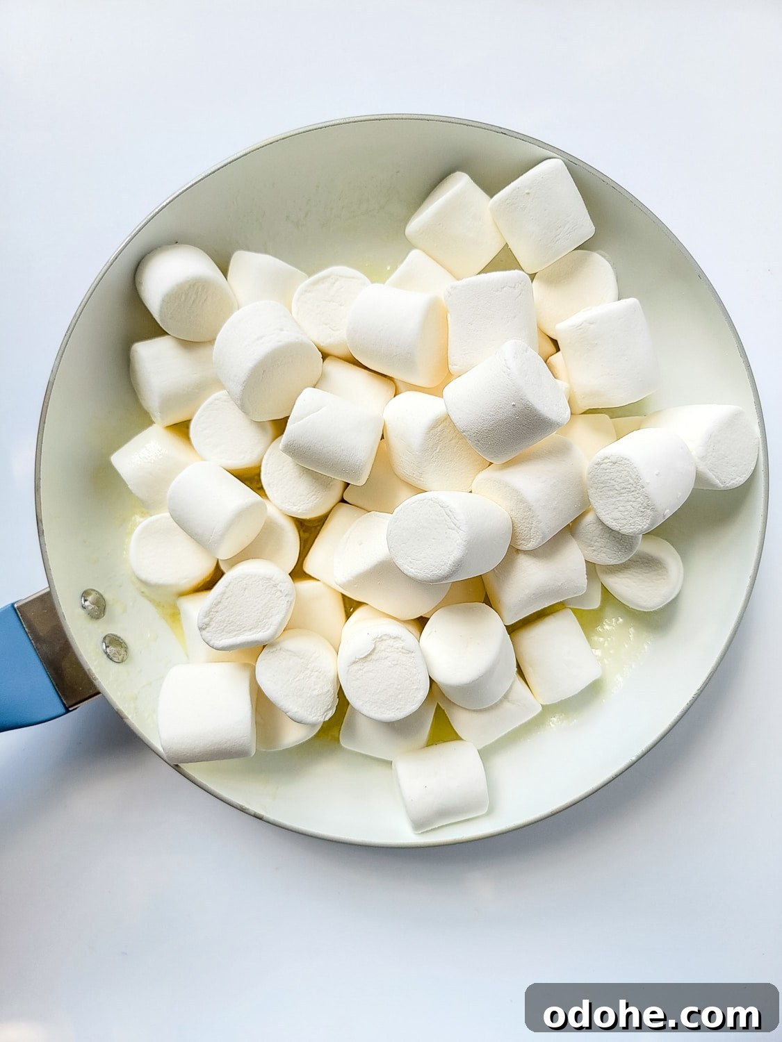 melted butter and jumbo marshmallows in a skillet