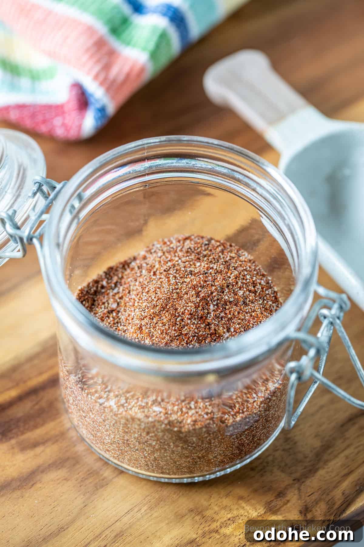 A jar filled with a spice mixture.