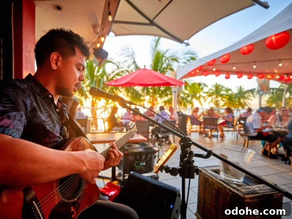 A performer on the lanai (balcony) at Tiki's Grill & Bar in Waikīkī.