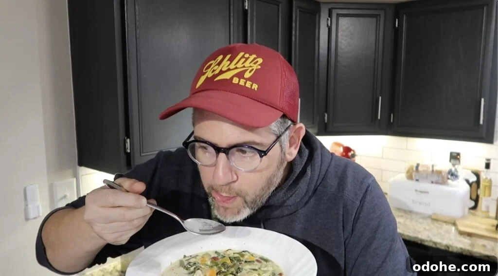 Man trying soup