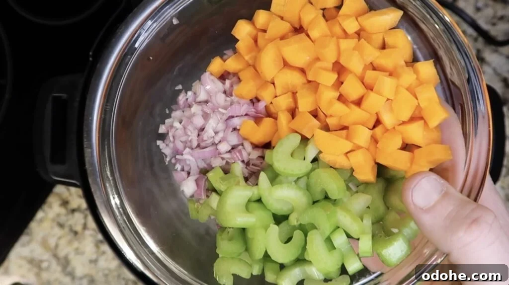 Adding mirepoix to pot