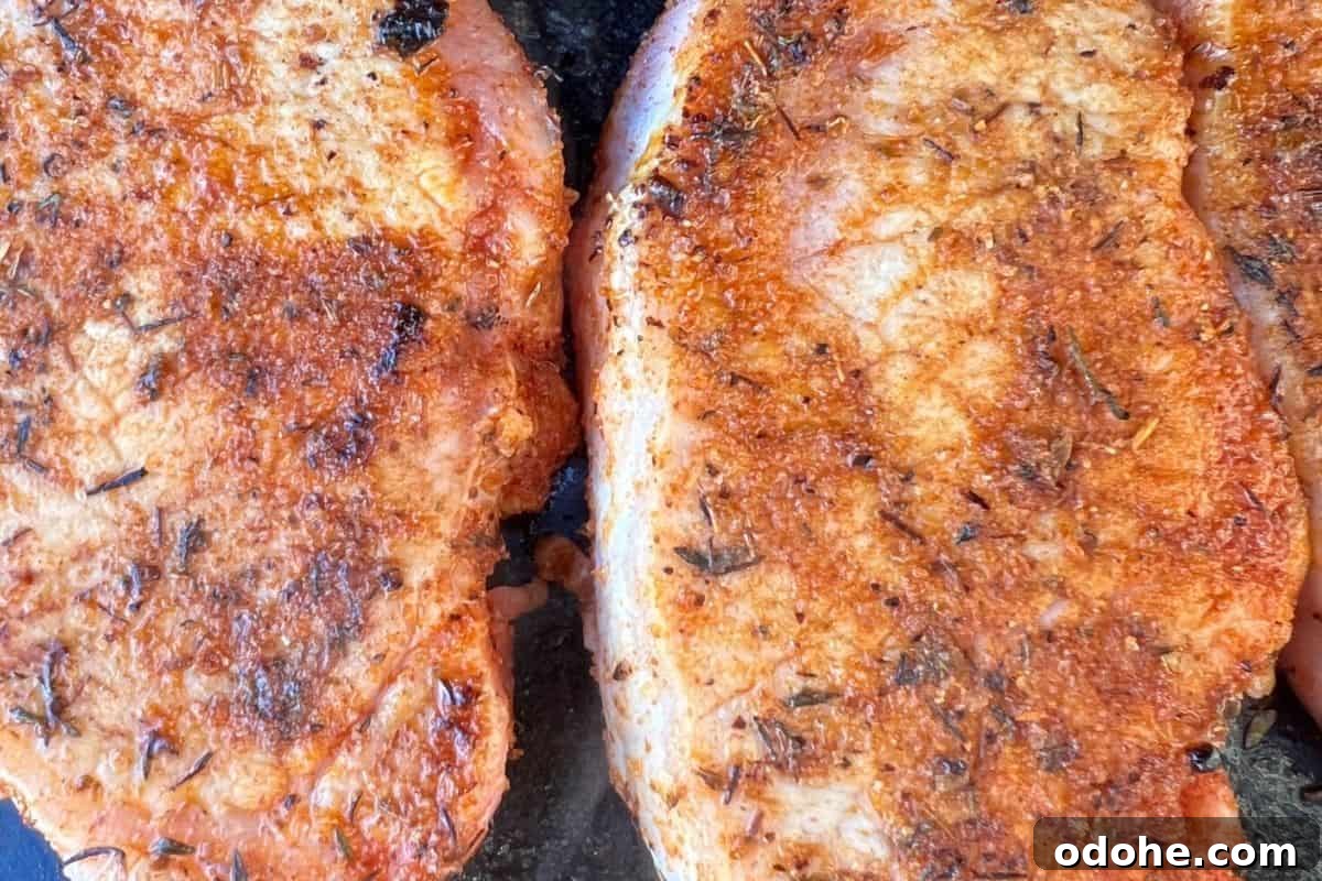 Cooked Pork Chops on Blackstone Griddle. 