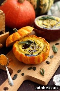 Pumpkin-Millet Soup Served in Roasted Pumpkin Bowls 3 Easy Pumpkin Soup with Millet in Pumpkin Bowls with a Spoonful of Spice next to the Pumpkin Bowl