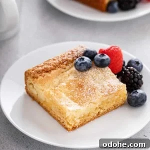 Plated slice of gooey butter cake.
