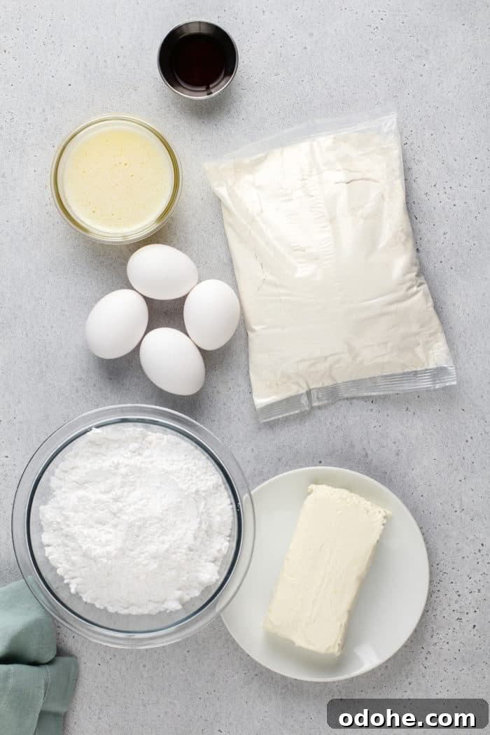 Easy gooey butter cake ingredients arranged on a gray countertop.