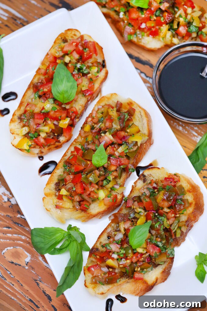 Authentic Italian Tomato Bruschetta Recipe for Summer Gatherings 3 Photo of tomato bruschetta with basil.