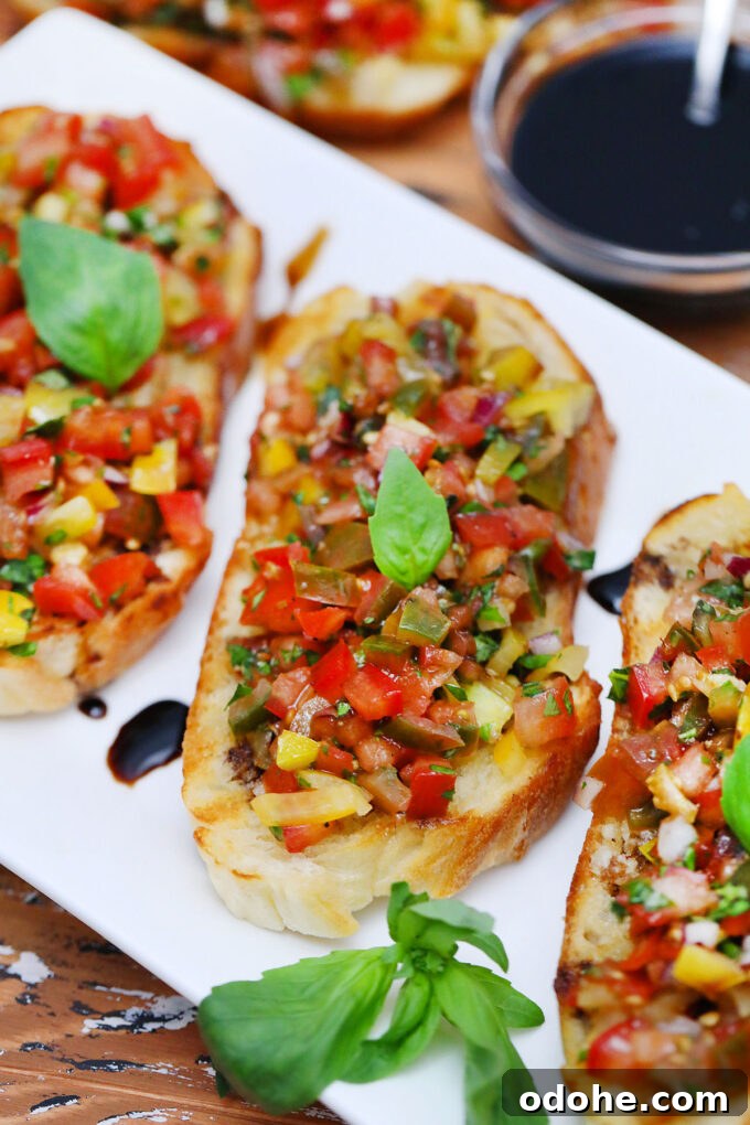 Authentic Italian Tomato Bruschetta Recipe for Summer Gatherings 6 Image of tomato bruschetta with balsamic reduction.