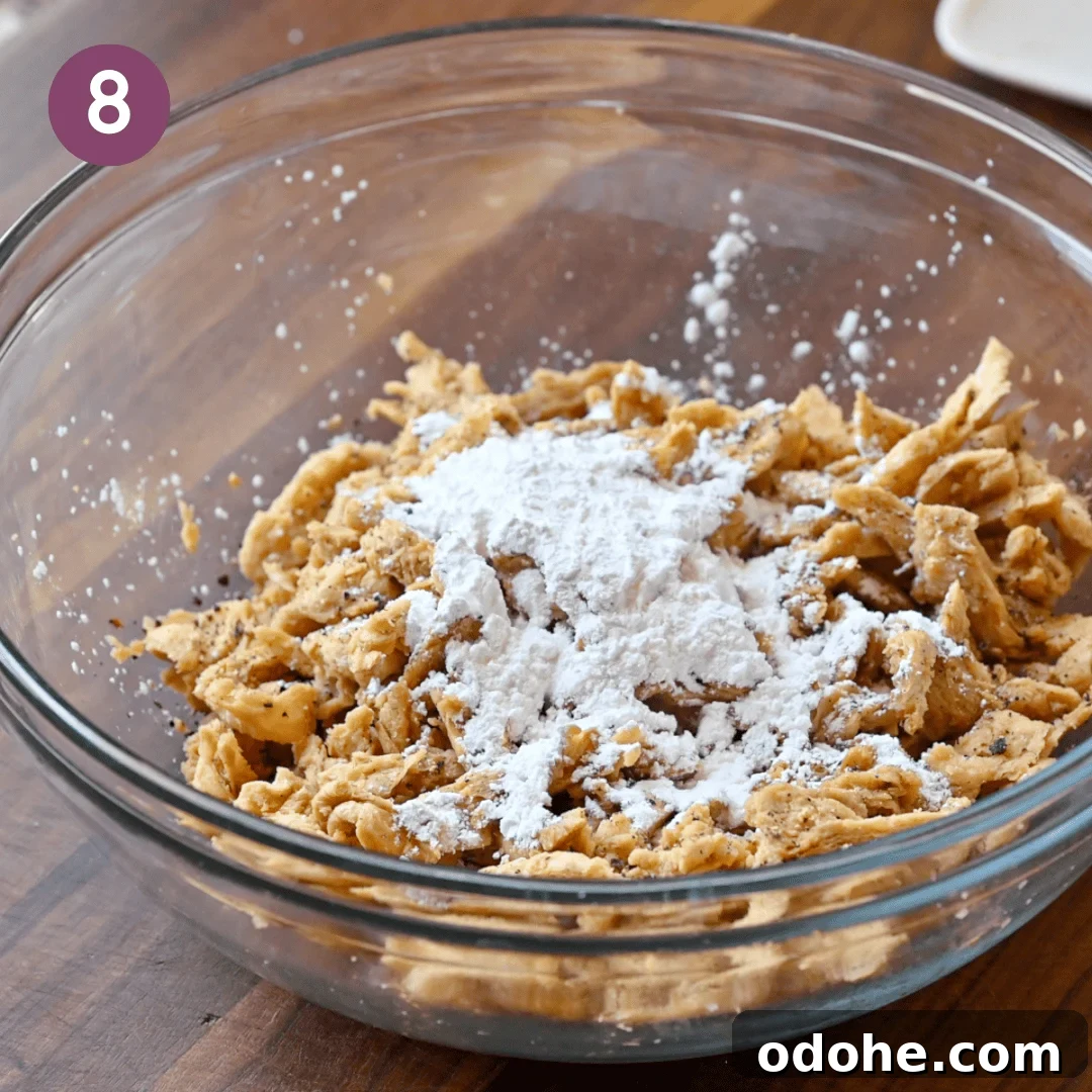 Cornstarch added to the soy curls with tamari.