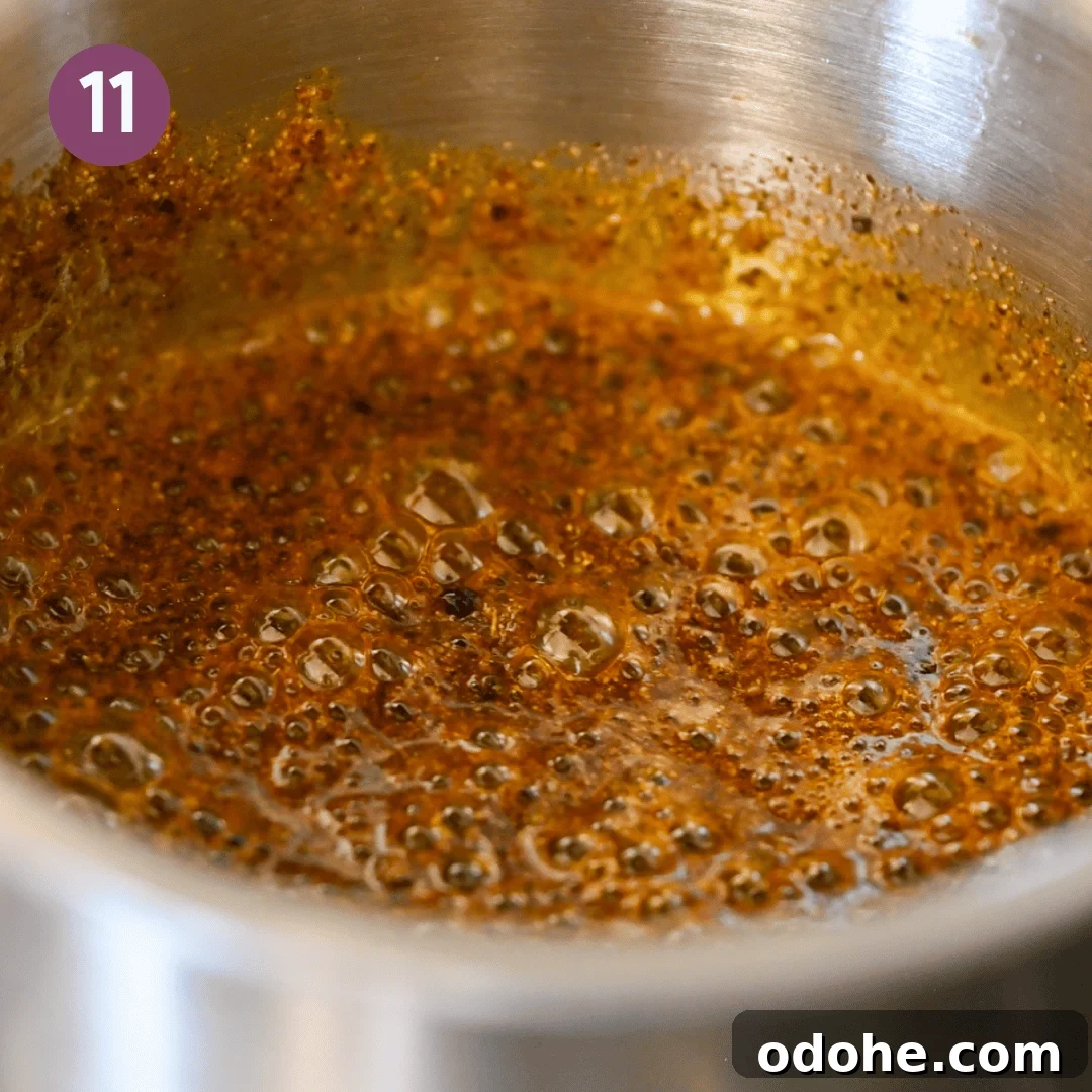 close up of the tempered oil in the saucepan.