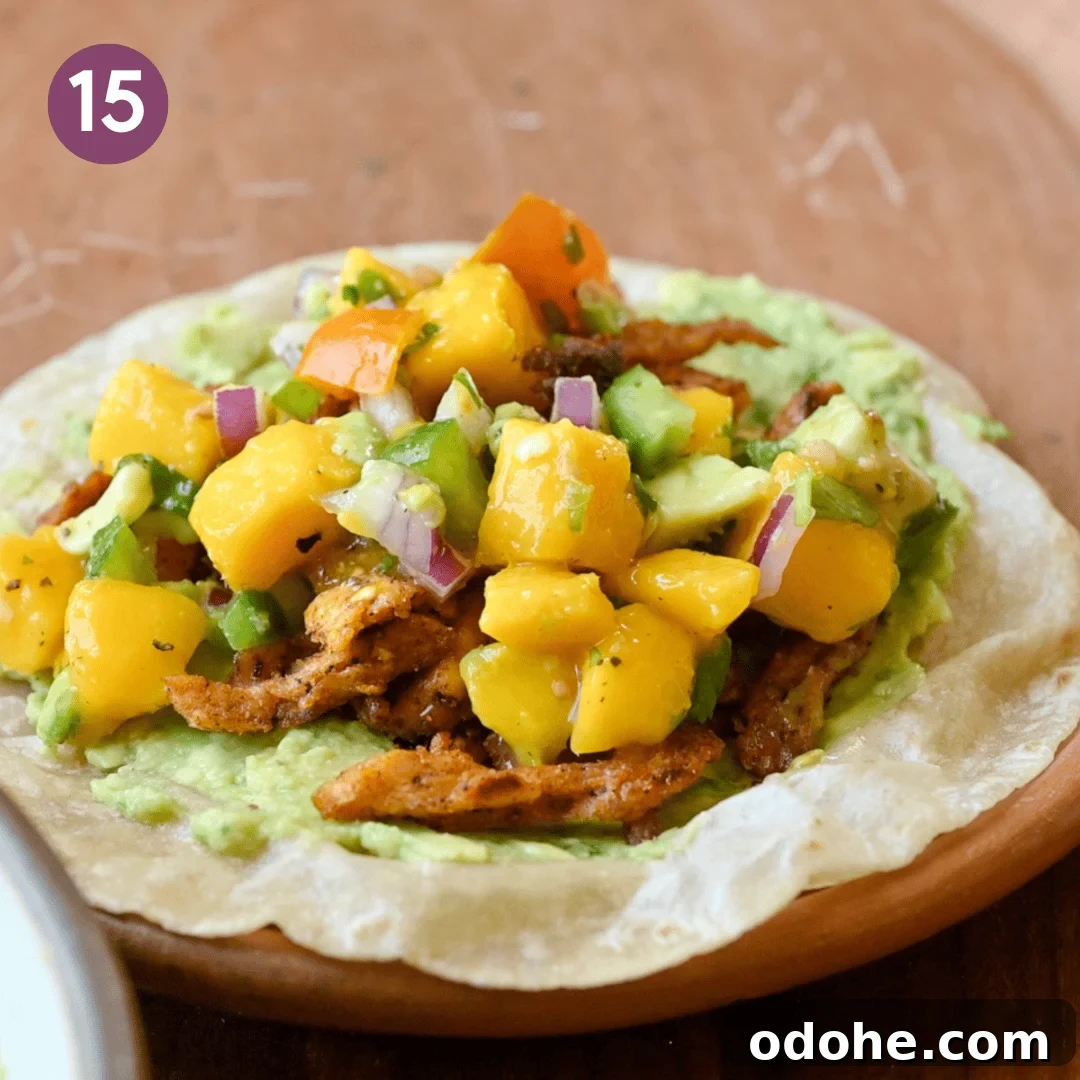 mango avocado salsa and lime juice added to the taco.