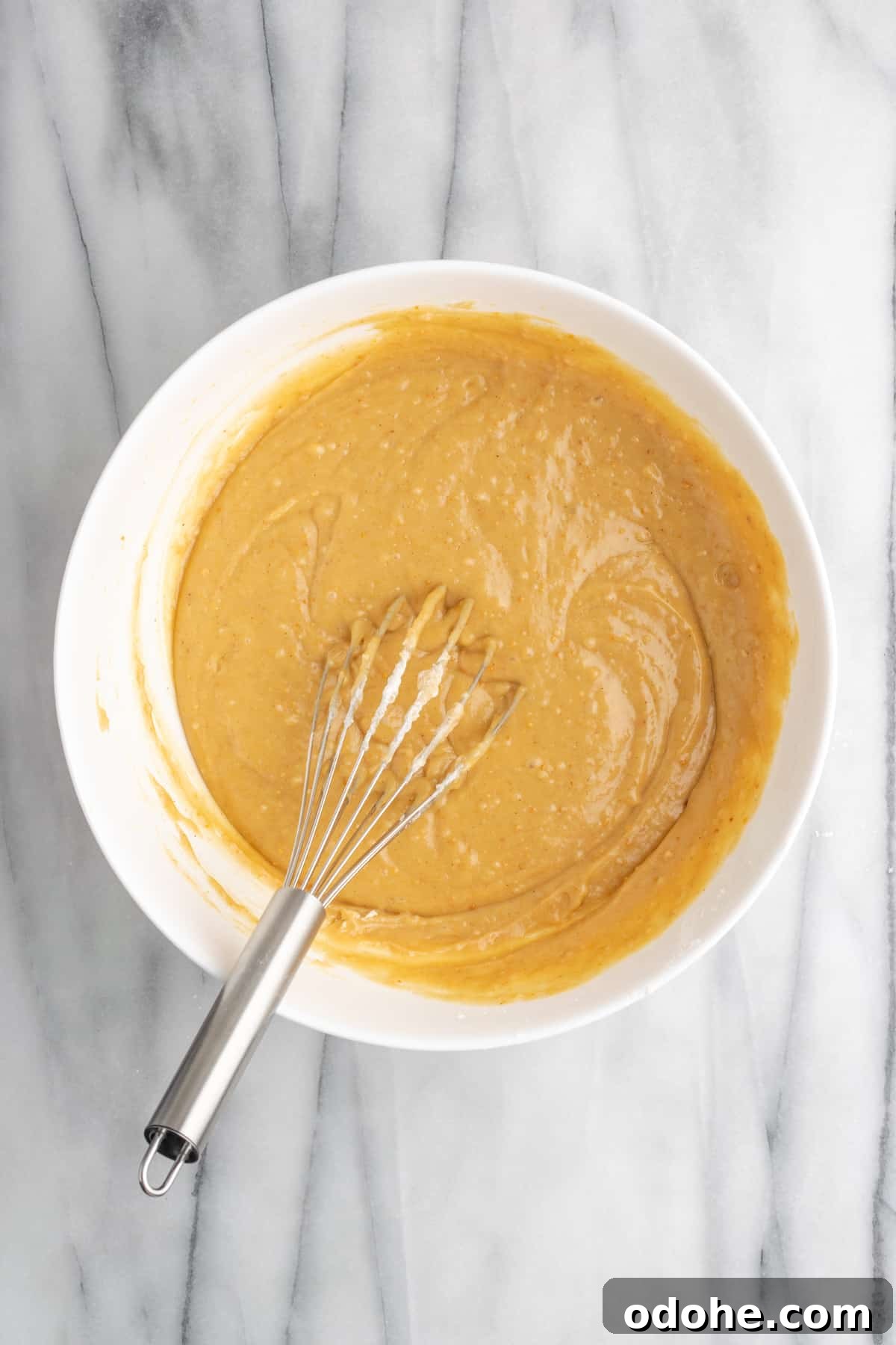 This delicious vegan peanut butter cake recipe is quick and easy to make, bursting with flavor, and the perfect treat with coffee or ice cream Peanut butter cake batter