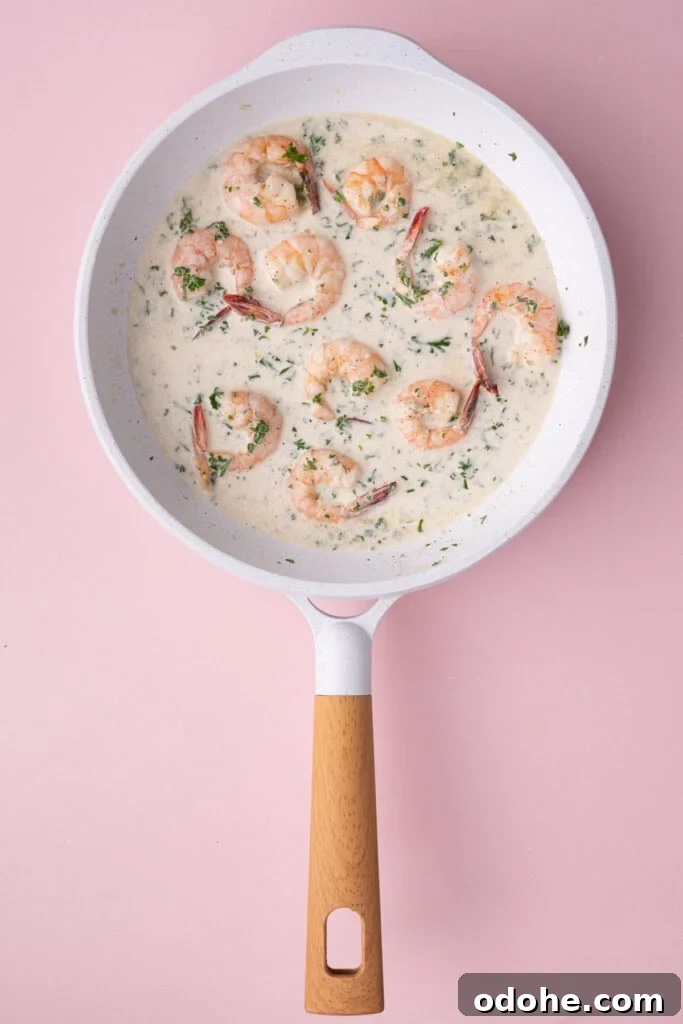 Creamy One-Pan Shrimp Scampi Recipe for Quick Weeknight Dinners 13 Creamy shrimp scampi hot and ready in a pan.