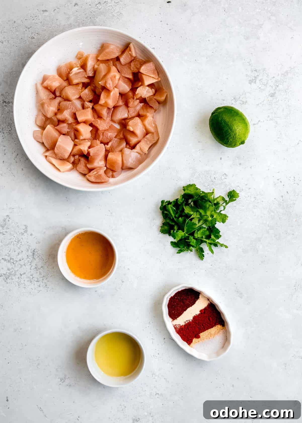 Cilantro Lime Chicken Bites for Air Fryer: Quick & Flavorful 3 cilantro lime chicken bite ingredients on a white table