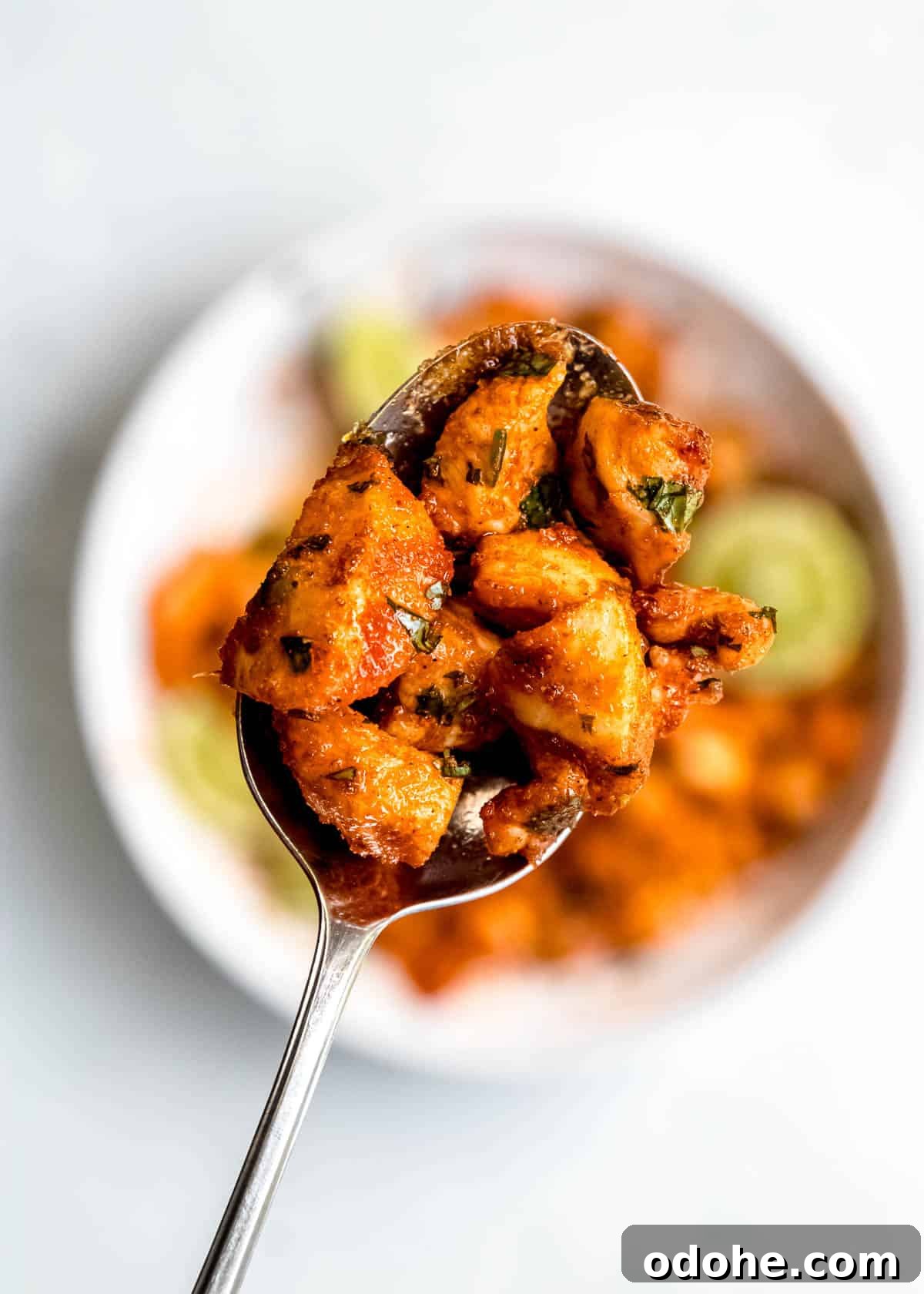 Cilantro Lime Chicken Bites for Air Fryer: Quick & Flavorful 10 close up shot of a spoonful of air fryer cilantro lime chicken bites
