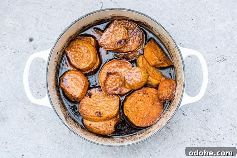 Southern Candied Sweet Potatoes with Brown Sugar and Pecans 5 candied sweet potatoes ready to serve