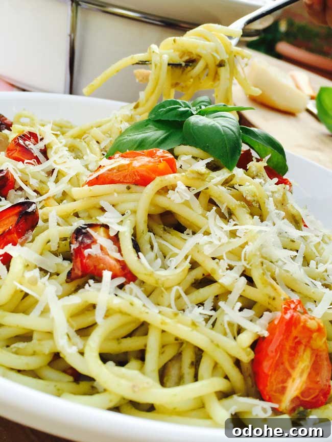 Roast Tomato, Chicken & Homemade Pesto Pasta Recipe 4 Tasting some homemade pesto pasta with a fork