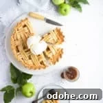 baked apple pie with ice cream on top