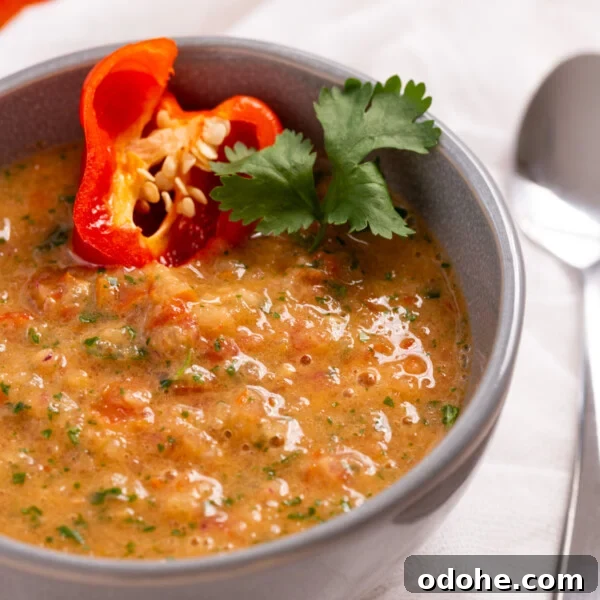 A close up image of habanero salsa in a small bowl.