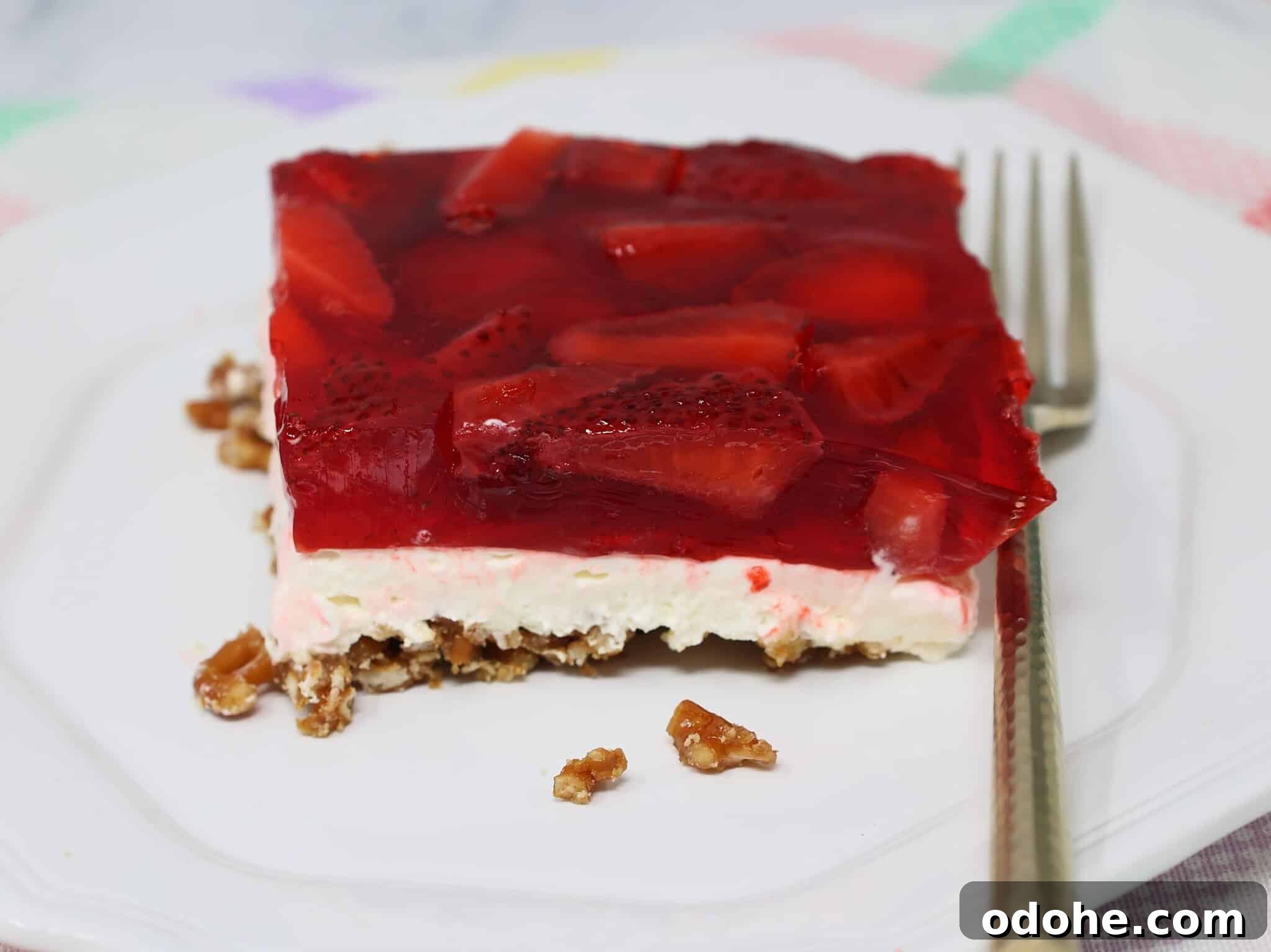 Make-Ahead Strawberry Pretzel Salad with Fresh Berries 5 Fully set strawberry pretzel salad after chilling with firm layers ready to slice and serve