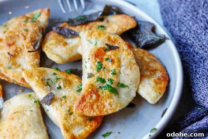 Roasted Butternut Squash and Feta Pierogi Recipe 12 Roasted Butternut Squash Feta Pierogi is an amazing dish that combines American fall flavors with a taste from the Greek islands, wrapped in Polish dough