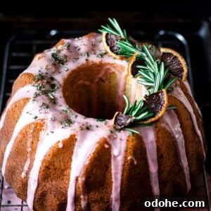 Blood orange rosemary bundt cake on cooling rack.