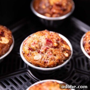 Air Fryer Strawberry Muffins Recipe for Moist, Quick Bakes 4 closeup image of freshly baked strawberry muffins in an air fryer