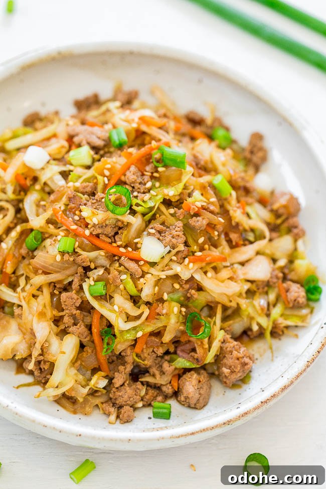 Chicken Egg Roll in a Bowl — This egg roll in a bowl is easy, ready in 15 minutes, full of flavor, has lots of texture, and is healthier than actual egg rolls!