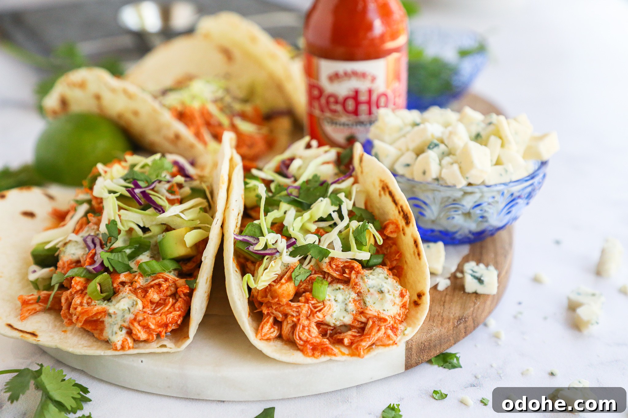 Baked Buffalo Chicken Tacos with Cilantro-Lime Crema 6 Looking for a quick meal idea? Try this delicious and easy taco recipe! It only takes 15 minutes to cook the chicken and the sauce can be made beforehand too!