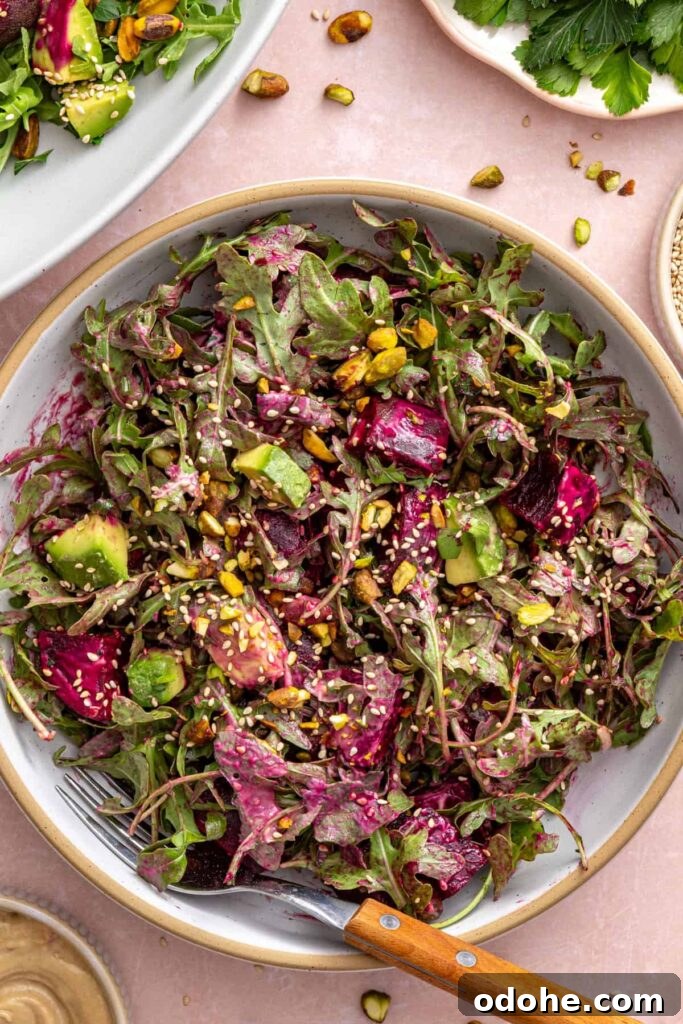 Roasted Beet Salad with Lemon Tahini Dressing and Pistachios 6 Roasted beet salad in a serving bowl on a styled table