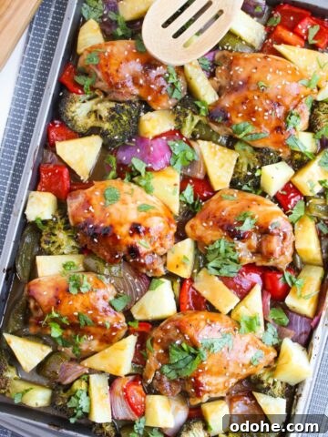 baked hawaiian chicken thighs on a sheet pan