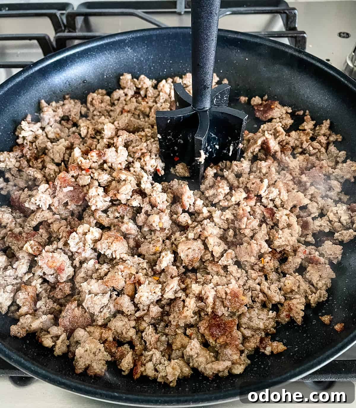 Sausage and Hashbrown Breakfast Casserole Recipe for Mornings 3 sausage browning in a skillet